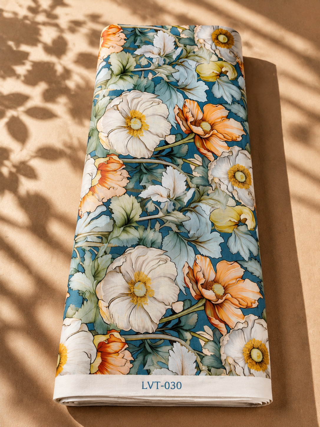 2026/08/1000059204.png Teal blue cotton with large ivory and soft orange flowers, accented by layered sage-green foliage - Italian Cotton (PC02) - Image 1