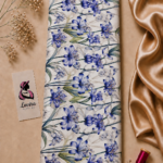 Elegant blue floral design featuring graceful blossoms, flowing green leaves, and delicate botanical details on a soft ivory background - Italian Silk (ST01)