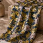 Soft ivory blossoms framed by golden leaves over a deep royal blue base - Chiffon Zari (ZR16)
