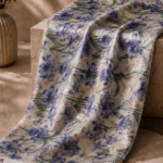 Elegant blue floral design with green leaves and shimmering gold zari details - Chiffon Zari (ZR16)