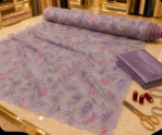 ⁦French embroidered lace in dreamy lavender and soft pink, adorned with delicate floral details and shimmering crystal embellishments.⁩ - الصورة ⁦3⁩