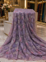⁦French embroidered lace in dreamy lavender and soft pink, adorned with delicate floral details and shimmering crystal embellishments.⁩ - الصورة ⁦2⁩