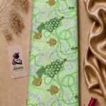Elegant chain print in fresh green tones with decorative links, tassels, and polka dot accents-Italian Silk (ST01)