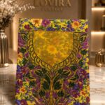 Ready-made embroidered cotton featuring a blooming garden floral print with an intricately embroidered neckline and elegant metallic accents.(Swiss Cotton)