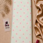 Classic polka dot print featuring soft blush pink dots on a light mint background-Italian Silk (ST01)