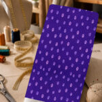 Soft lavender polka dots on a rich deep purple background.