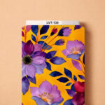 Vibrant floral design featuring large purple and lilac blossoms with deep blue foliage and rich magenta accents over a bright golden-yellow background.