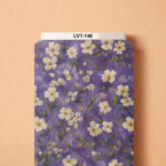 Soft ivory blossoms with delicate green foliage scattered across a painterly lavender-purple background, creating an elegant and romantic floral design.