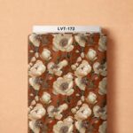 Elegant ivory blooms with soft olive leaves on a rich warm rust background.
