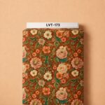Ornate vintage florals with elegant green scrollwork on a rich rust-red background.