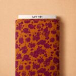 Deep burgundy florals spread across a rich burnt-orange background for a bold, elegant look.