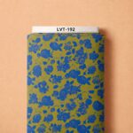 Striking royal-blue florals over a warm mustard background, creating a bold and refined contrast.