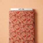Delicate red roses and leafy vines arranged in graceful loops over a warm peach background.