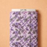 Soft lavender florals woven through elegant lattice lines for a graceful vintage look.