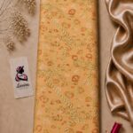 Premium printed silk fabric featuring elegant gold chain motifs on a warm apricot background-Italian Silk (ST01)