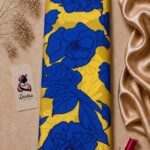 Premium printed silk fabric featuring bold royal blue floral motifs on a vibrant yellow background-Italian Silk (ST01)