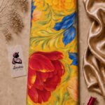 Bold oversized floral print with painterly blooms in rich red, blue, and golden yellow, accented by flowing green foliage on a warm yellow background-Italian Silk (ST01)