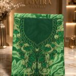 Ready-made embroidered fabric featuring a tropical leaf print with an elegant embroidered neckline and shimmering metallic accents.(Italian Cotton)