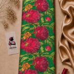 Bold crimson floral print on a rich emerald green background with golden foliage and warm orange botanical accents-Italian Silk (ST01)