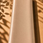 Elegant plain silk in a soft champagne gold shade, with a warm glow and refined luxurious finish.