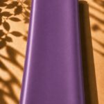 Graceful plain silk in a rich violet purple shade, adding a distinctive and luxurious touch.
