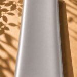 Elegant plain silk in a sleek silver shade, with a smooth finish and subtle luminous glow.