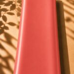 Vibrant plain silk in a beautiful coral pink shade, bringing a fresh and elegant touch.