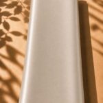 Timeless plain silk in a soft pearl cream shade, with a delicate sheen and sophisticated finish.