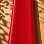 Striking plain silk in a vibrant red shade, bringing bold elegance and a luxurious touch.