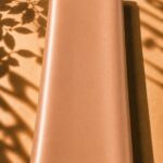 Delicate plain silk in a warm peach shade, bringing a soft and graceful touch to any look.
