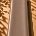 Elegant plain silk in a refined warm taupe shade, featuring a silky-smooth finish and subtle luxurious glow.
