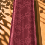 Premium silk featuring delicate floral detailing and sleek vertical lines in an elegant burgundy shade - Jacquard Silk (JD08x2)