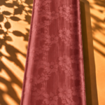 Elegant blooming floral pattern with subtle vertical detailing in a warm rosewood tone - Jacquard Silk (JD08x2)