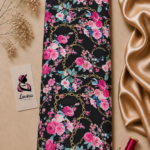 Luxurious black Italian silk with vibrant pink florals, blue-green leaves and elegant gold chain details - Italian Silk (ST01)