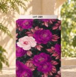 Bold floral design with rich magenta and soft blush blooms, rose-toned foliage, and deep charcoal leaves on a black background.