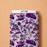 Deep purple and plum florals with soft lavender foliage, arranged elegantly over a delicate ivory background