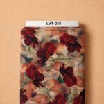 Dramatic burgundy blooms layered with soft peach florals and muted green accents for a rich romantic look.