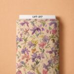 Delicate watercolor florals in lavender and soft pink, scattered gracefully over a warm ivory background