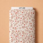 Delicate red floral vines and playful heart details scattered over a soft ivory background.