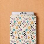 Playful tulip-inspired florals in turquoise, lavender, peach, and golden tones with delicate stems and leaves on a soft cream background.