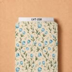 Delicate blue tulip floral print with graceful green vines and subtle botanical accents on a soft cream background.