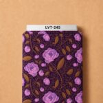 Elegant pink floral print with warm bronze leaves and delicate winding vines on a deep plum background.