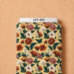Elegant rust, blush, and ivory floral print with deep teal leaves on a warm golden cream background.