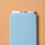 Delicate white botanical leaf pattern on a soft sky-blue background, creating a fresh and elegant look.