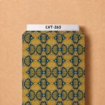 Bold fan-inspired geometric pattern in mustard gold and deep navy, accented with soft turquoise details.