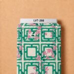 Artistic geometric grid in fresh green and ivory, decorated with delicate pink floral accents.
