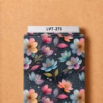 Dreamy floral design featuring soft pink, aqua, lavender, and peach blooms with delicate foliage and subtle golden accents on a deep charcoal background.