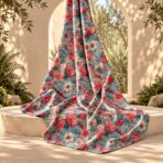 ⁦Romantic floral design featuring coral-red, blush pink, and soft cream blooms layered with muted teal-blue foliage for a rich botanical look.⁩ - الصورة ⁦2⁩