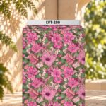 Rich floral design featuring layered pink and magenta blooms with soft blush accents and lush green foliage.