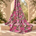 ⁦Rich floral design featuring layered pink and magenta blooms with soft blush accents and lush green foliage.⁩ - الصورة ⁦2⁩